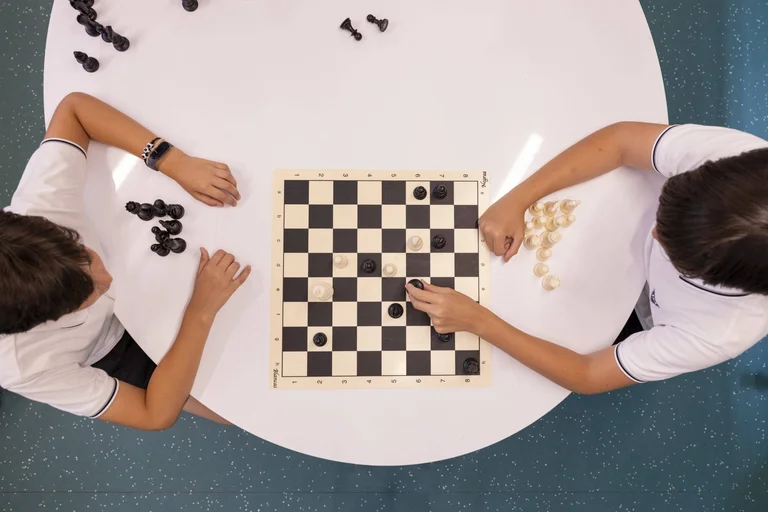 Children playing chess 