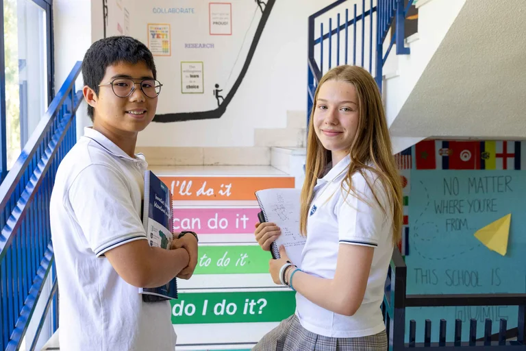 Secondary school children smiling  