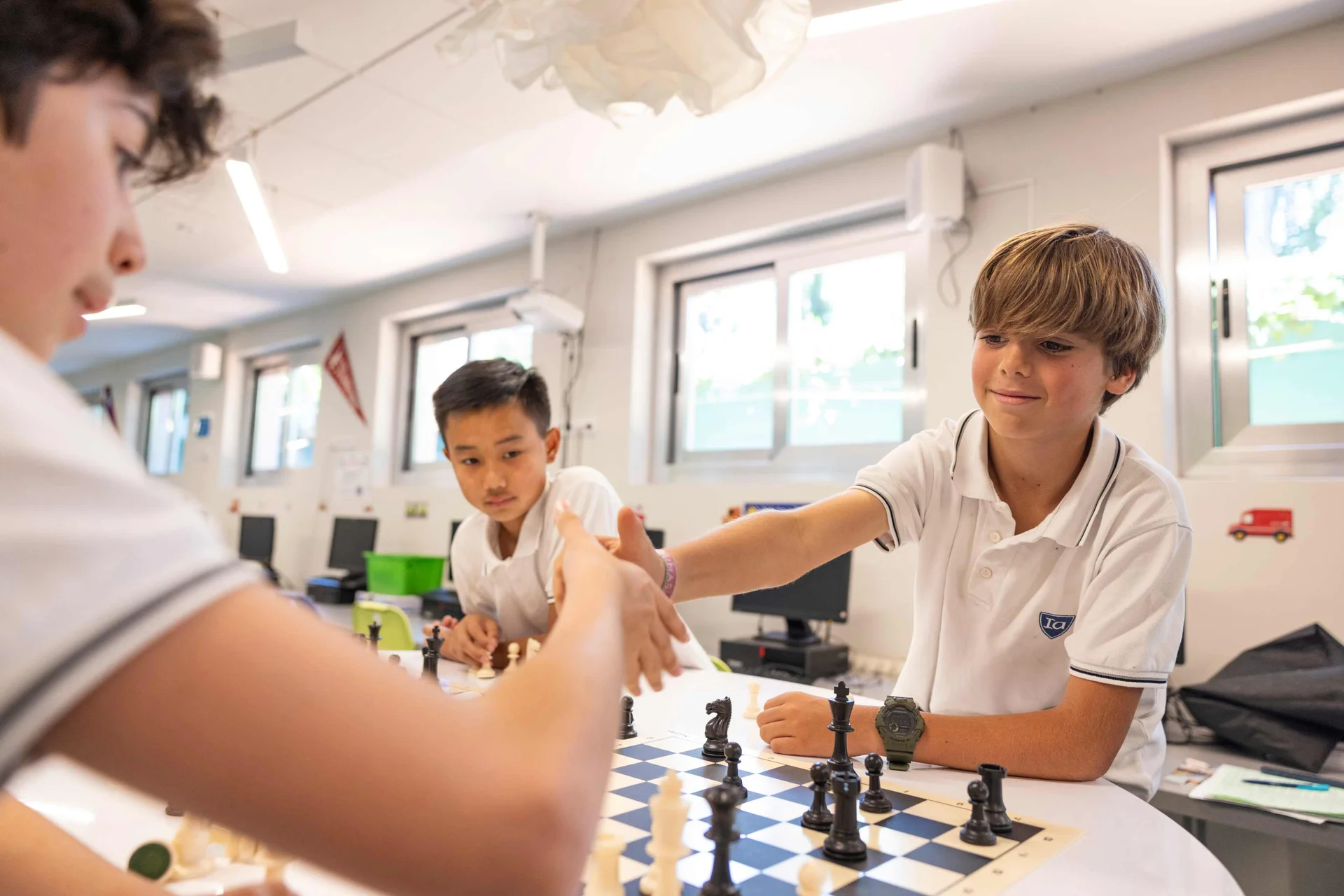 Students playing chess