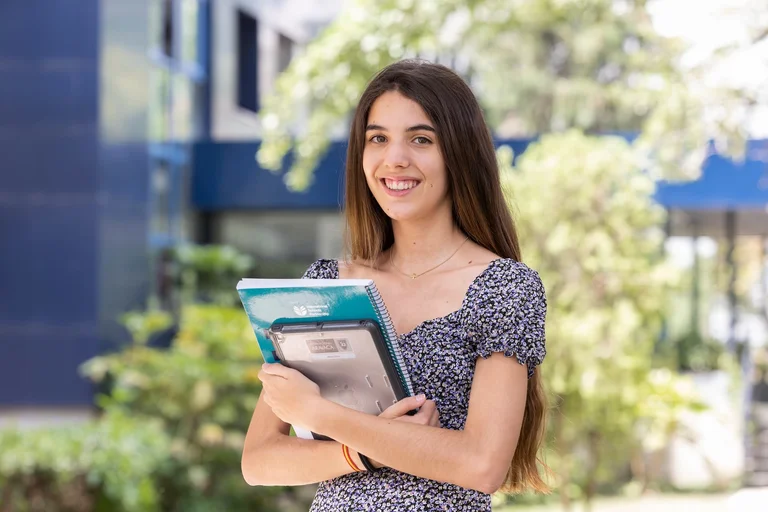 Student holding books