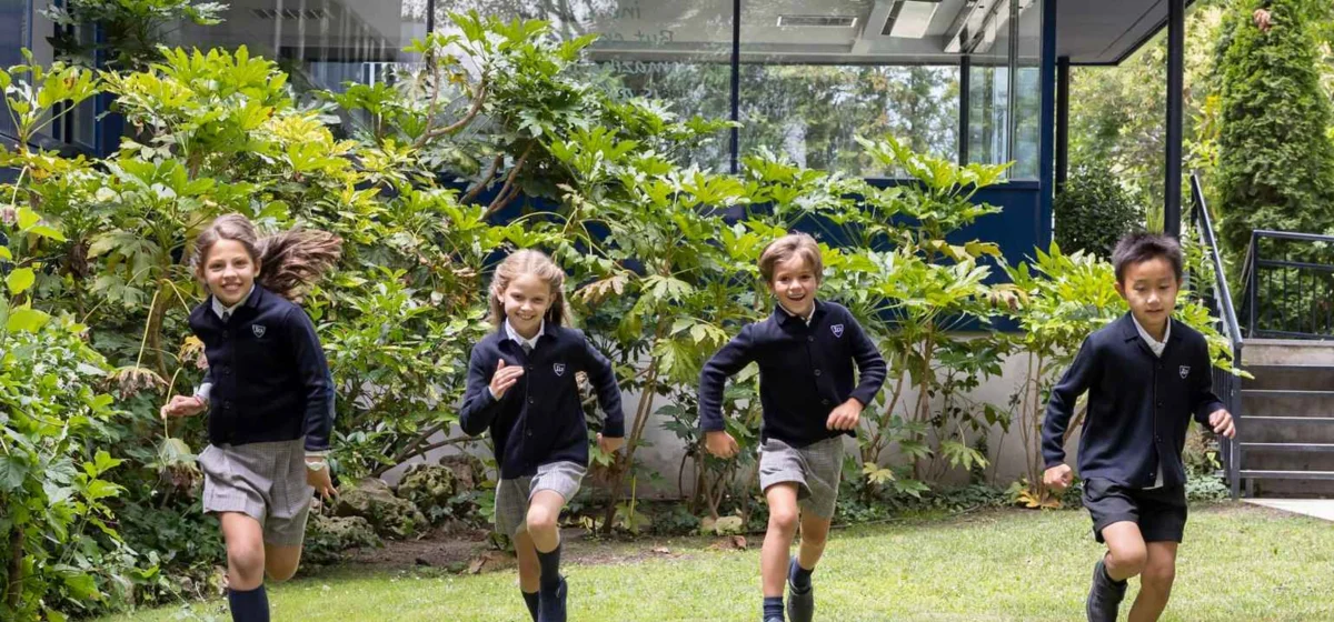 Students running in the schoolyard
