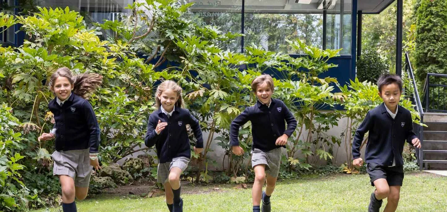 Students running in the schoolyard