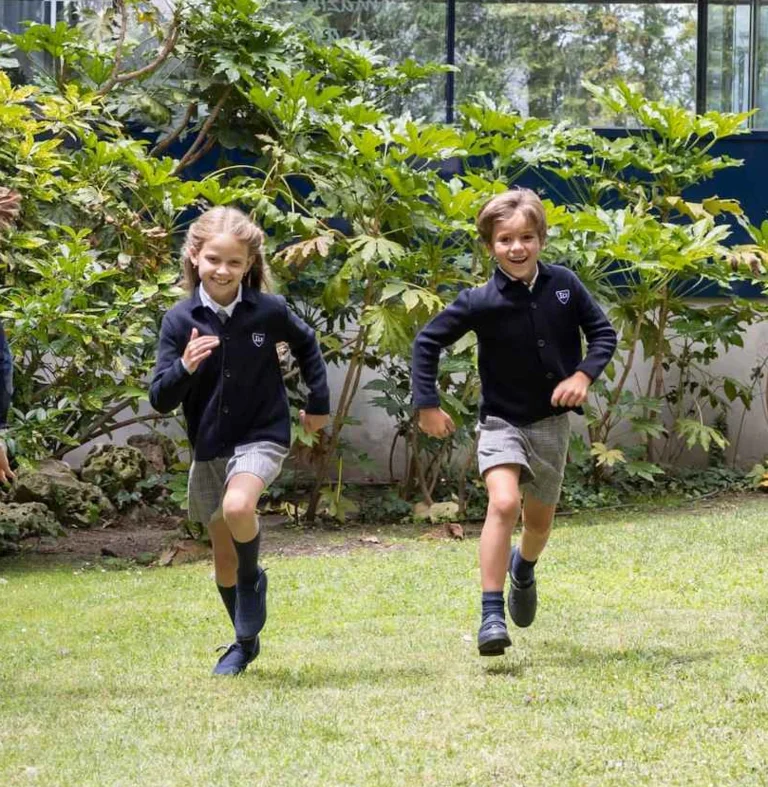 Students running in the schoolyard