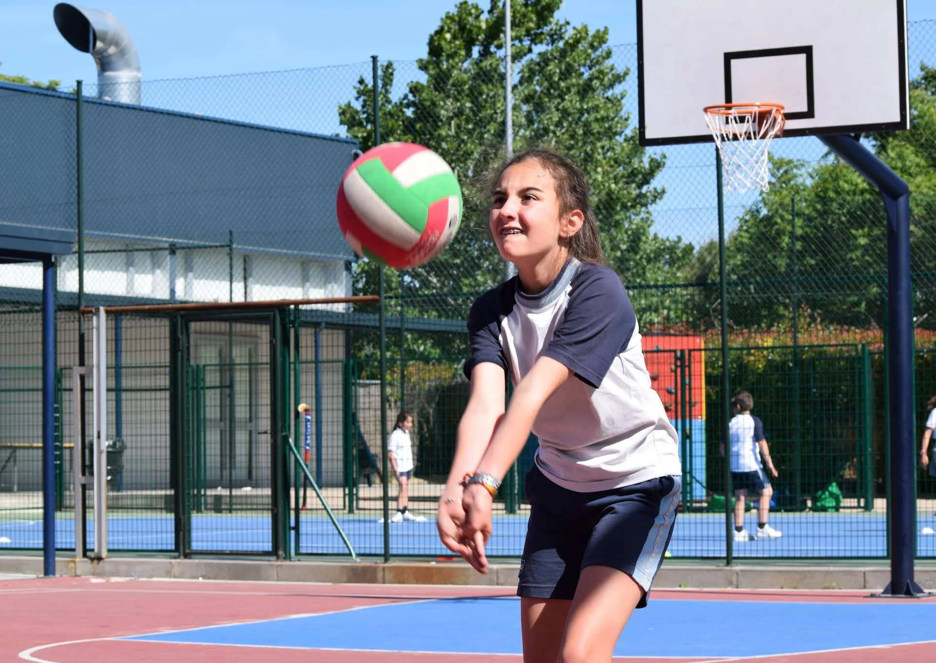 Student playing volleyball